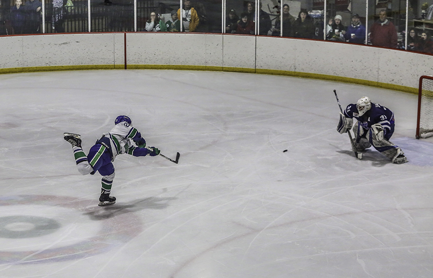 Markus Cook takes a shot against the Minnesota Moose on March 7.